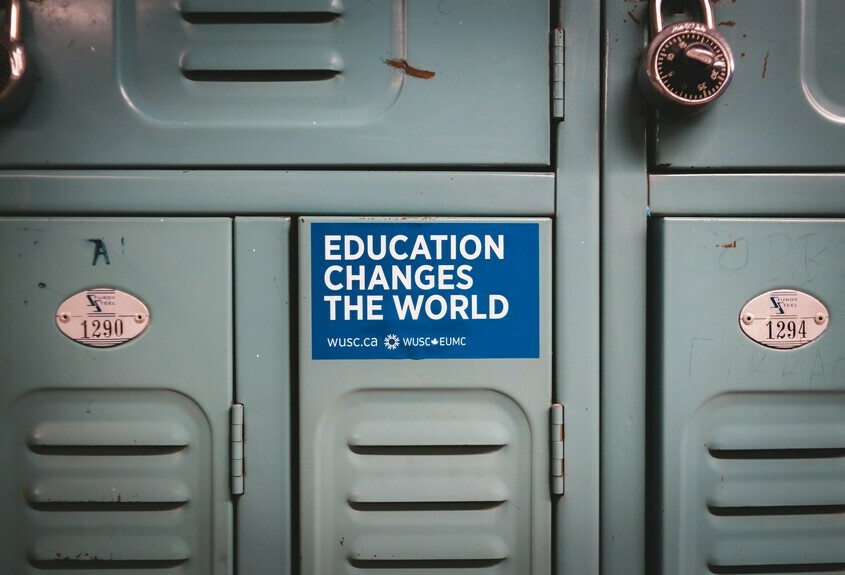 Education Changes the World sticker on school lockers